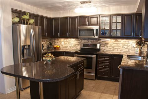 black cabinets with painted backsplash